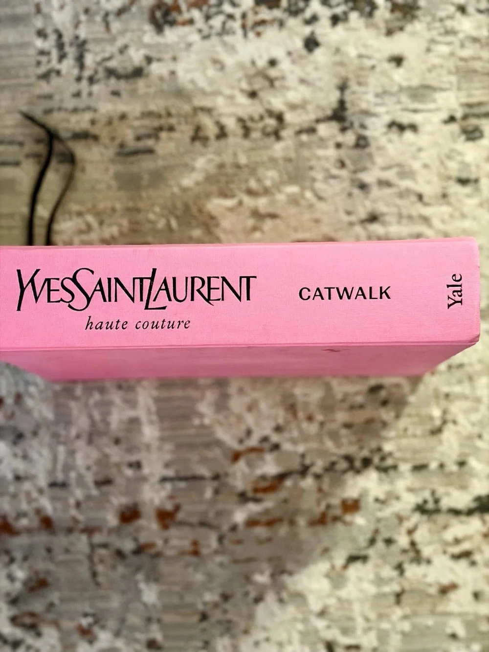 Yves Saint Laurent Pink Hardcover Haute Couture Book.